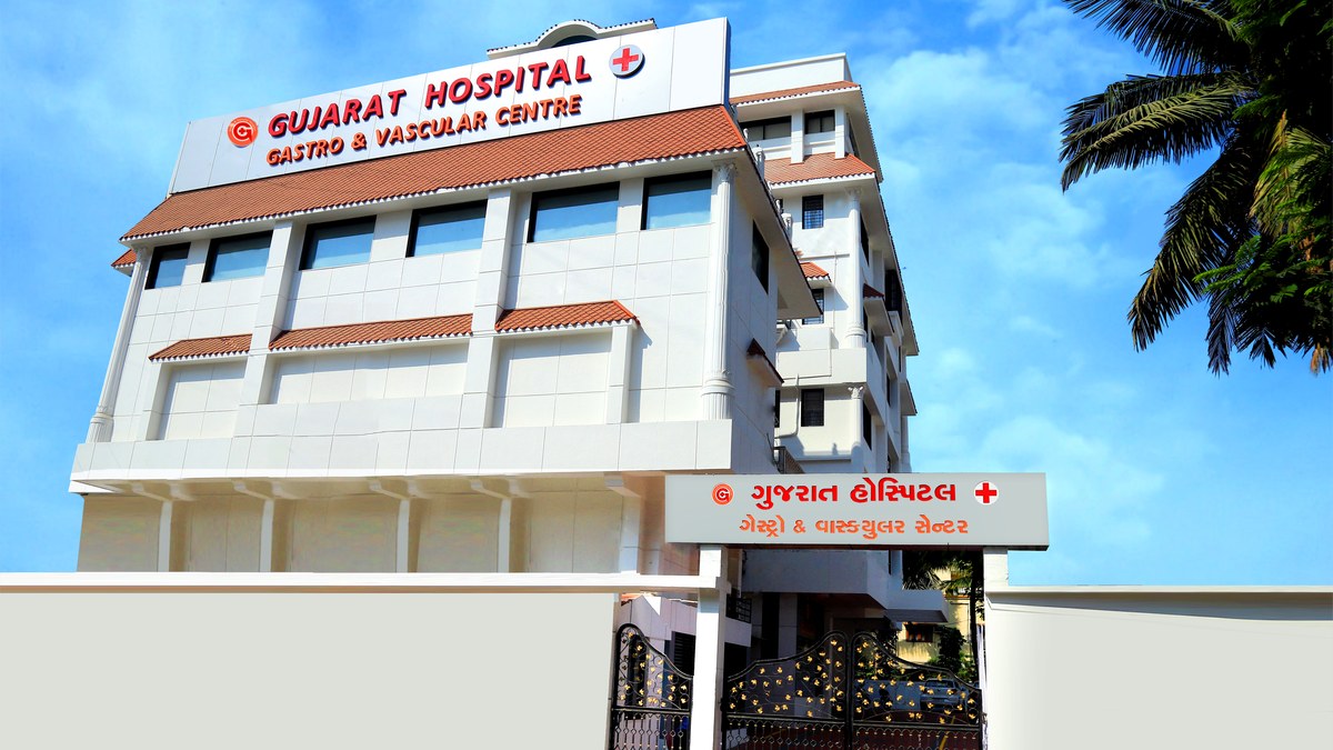 Multi-storey hospital building with a signboard